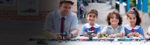 John the Baptist Bonnyrigg Heights teacher and students making things out of Legos